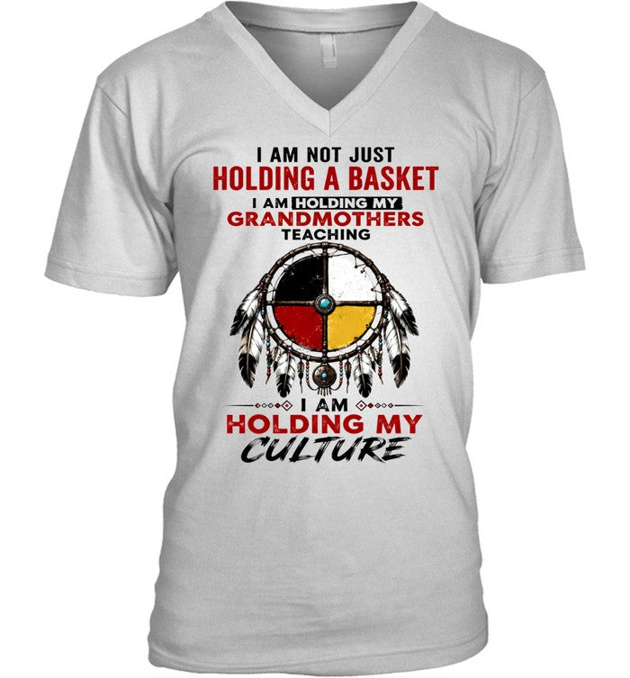 I AM NOT JUST HOLDING A BASKET I AM HOLDING MY GRANDMOTHERS TEACHING I AM HOLDING MY CULTURE