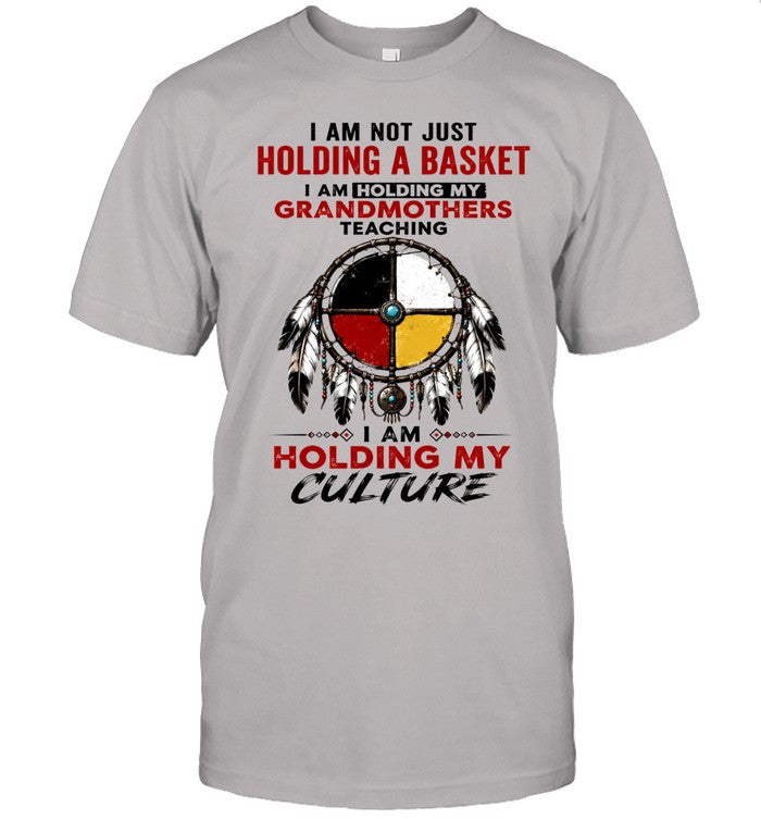 I AM NOT JUST HOLDING A BASKET I AM HOLDING MY GRANDMOTHERS TEACHING I AM HOLDING MY CULTURE