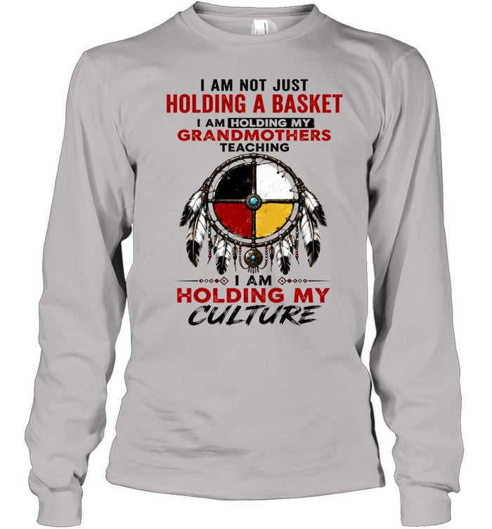 I AM NOT JUST HOLDING A BASKET I AM HOLDING MY GRANDMOTHERS TEACHING I AM HOLDING MY CULTURE