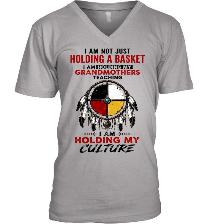 I AM NOT JUST HOLDING A BASKET I AM HOLDING MY GRANDMOTHERS TEACHING I AM HOLDING MY CULTURE