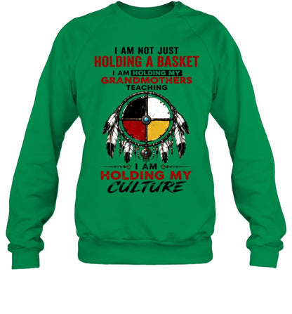 I AM NOT JUST HOLDING A BASKET I AM HOLDING MY GRANDMOTHERS TEACHING I AM HOLDING MY CULTURE