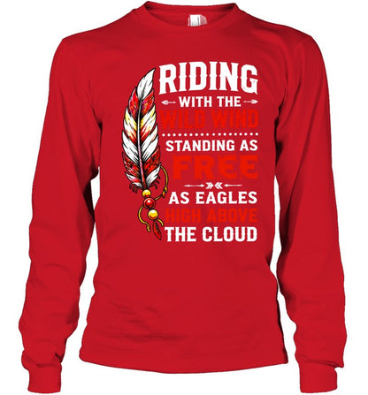 RIDING WITH THE WILD WIND STANDING AS FREE AS EAGLES HIGH ABOVE THE CLOUD