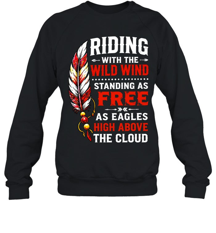 RIDING WITH THE WILD WIND STANDING AS FREE AS EAGLES HIGH ABOVE THE CLOUD
