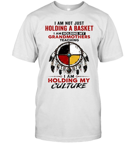 I AM NOT JUST HOLDING A BASKET I AM HOLDING MY GRANDMOTHERS TEACHING I AM HOLDING MY CULTURE