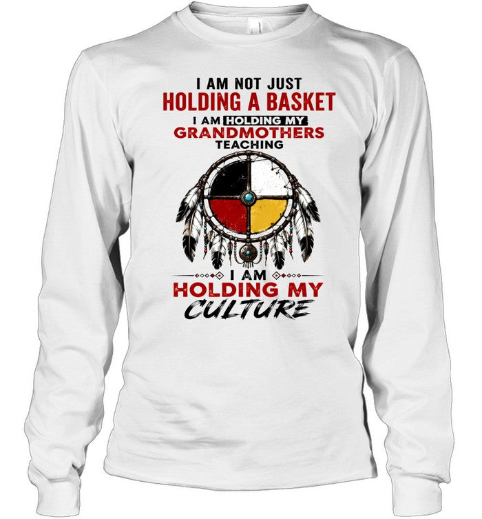 I AM NOT JUST HOLDING A BASKET I AM HOLDING MY GRANDMOTHERS TEACHING I AM HOLDING MY CULTURE