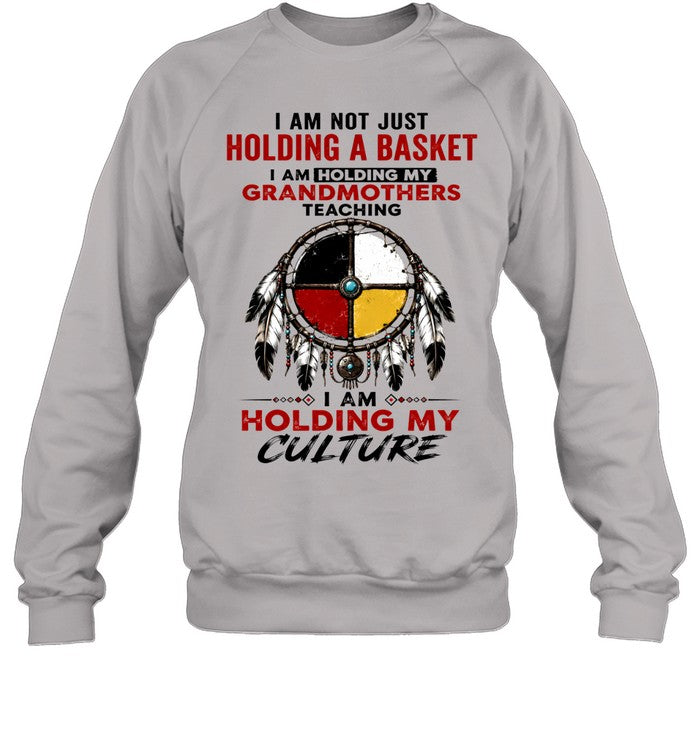 I AM NOT JUST HOLDING A BASKET I AM HOLDING MY GRANDMOTHERS TEACHING I AM HOLDING MY CULTURE