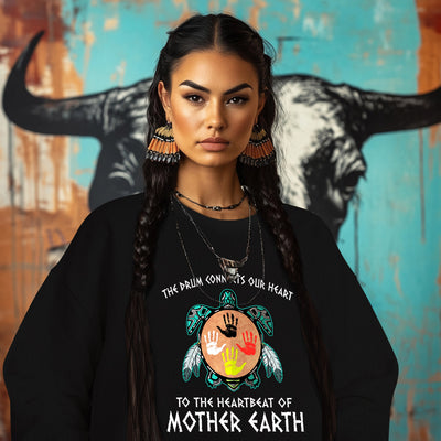 THE DRUM CONNECTS OUR HEART  TO THE HEARTBEAT OF MOTHER EARTH